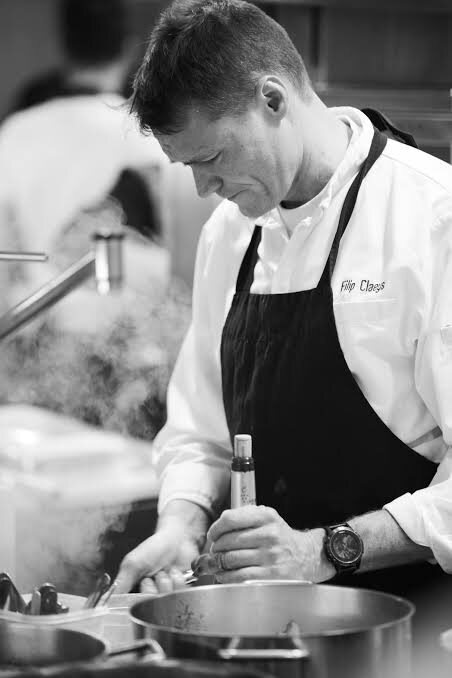 Chef Filip Claeys at two-Michelin-star Restaurant De Jonkman, a must-do dining experience in Bruges